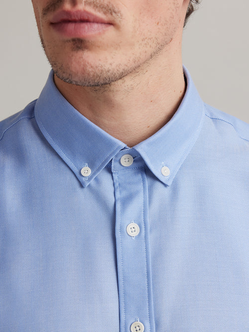 Button down collar on Oxford merino wool shirt in light blue collar with white buttons
