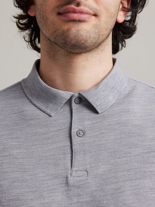 Collar of light grey melange polo in Climaforce merino wool from Wolk