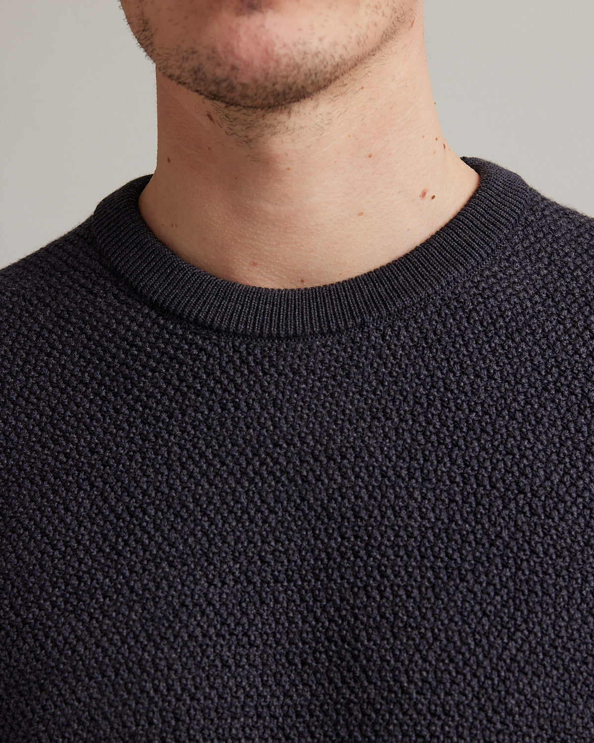 rice knit stitch on merino wool sweater with crew neck and double layered collar for men
