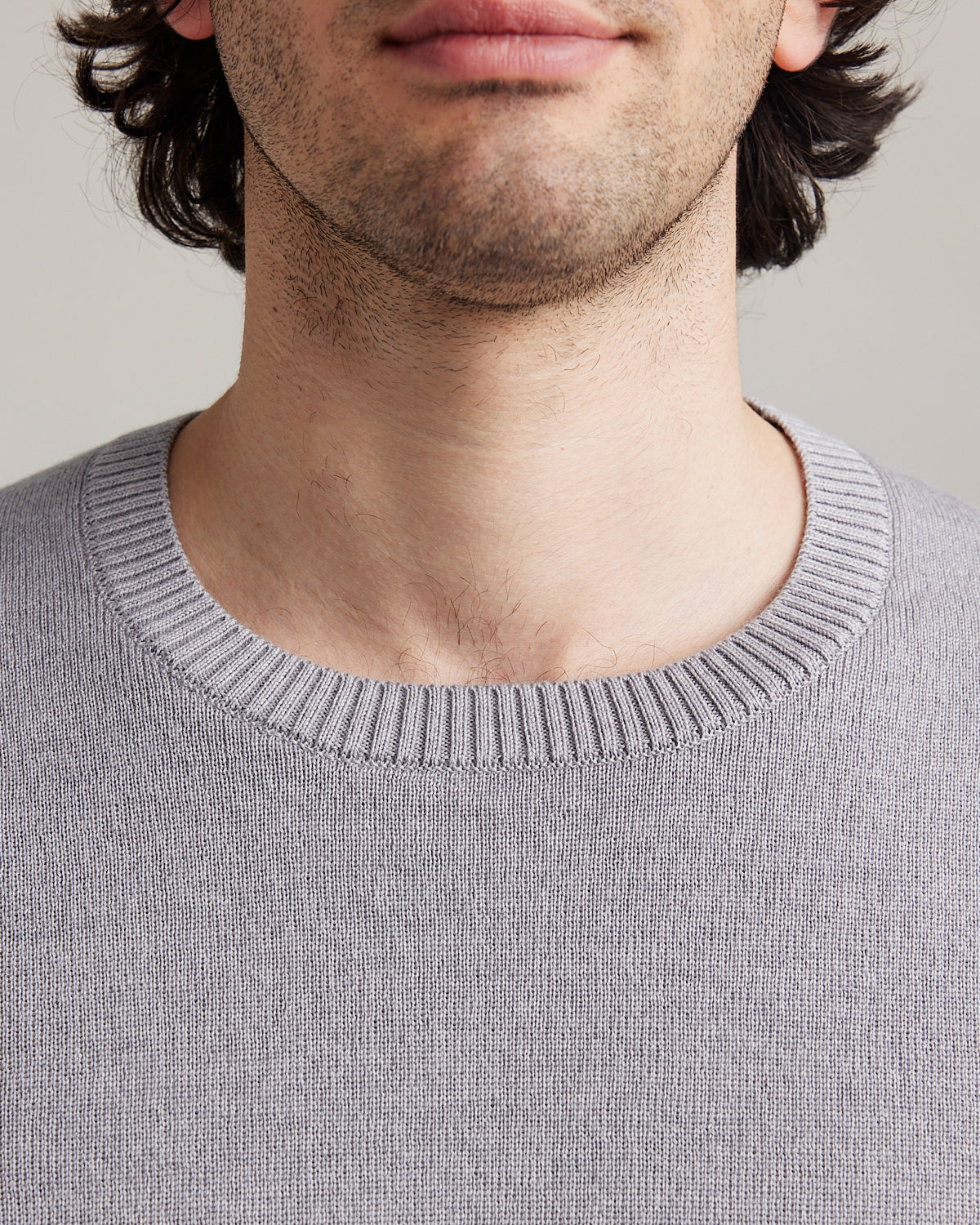 Merino wool sweater for men in light grey melange color with crew neck half milano stitch made in Portugal