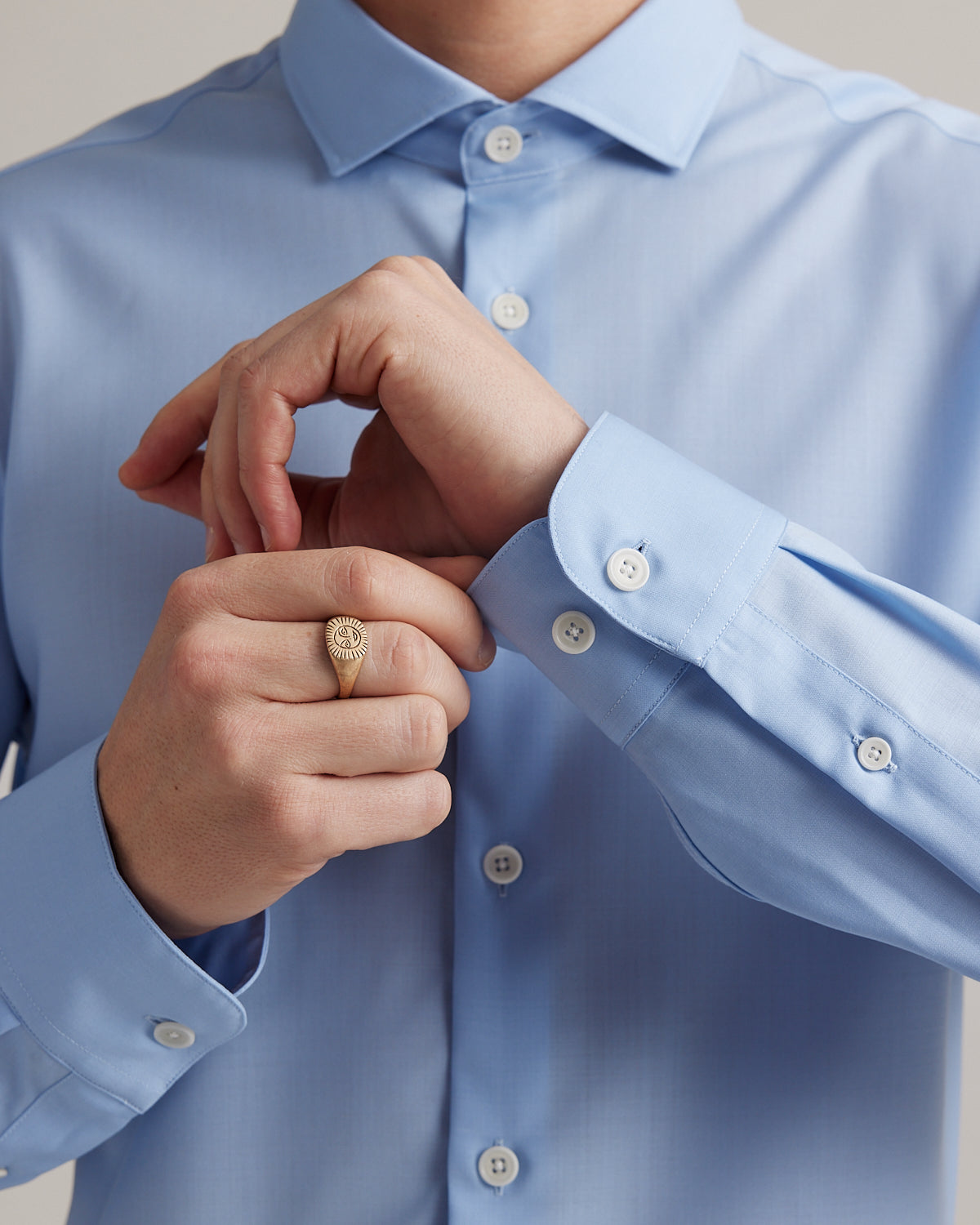 cuff details on men merino wool shirt with long sleeves in light blue with white buttons