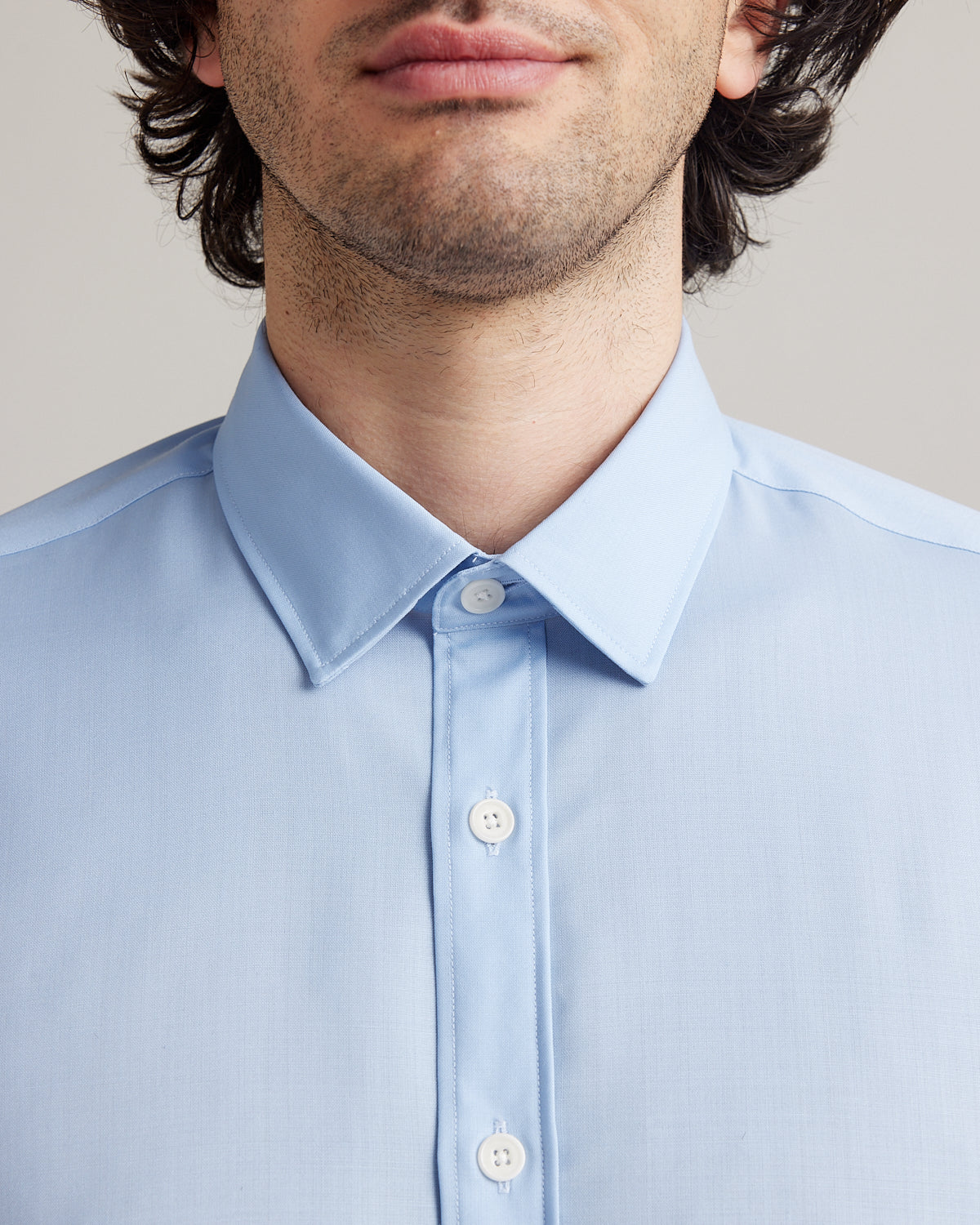 classic collar on a light blue merino wool shirt from Wolk