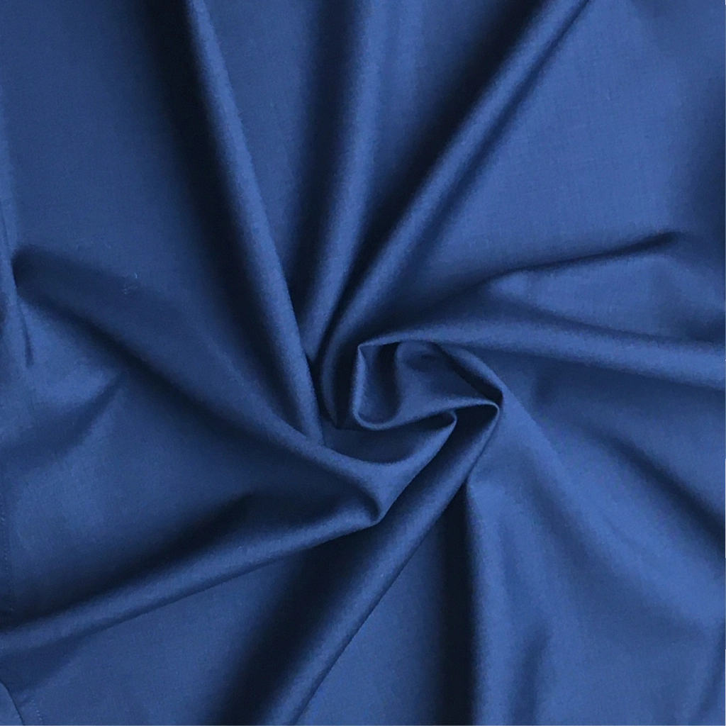 Close-up of blue fabric with folds