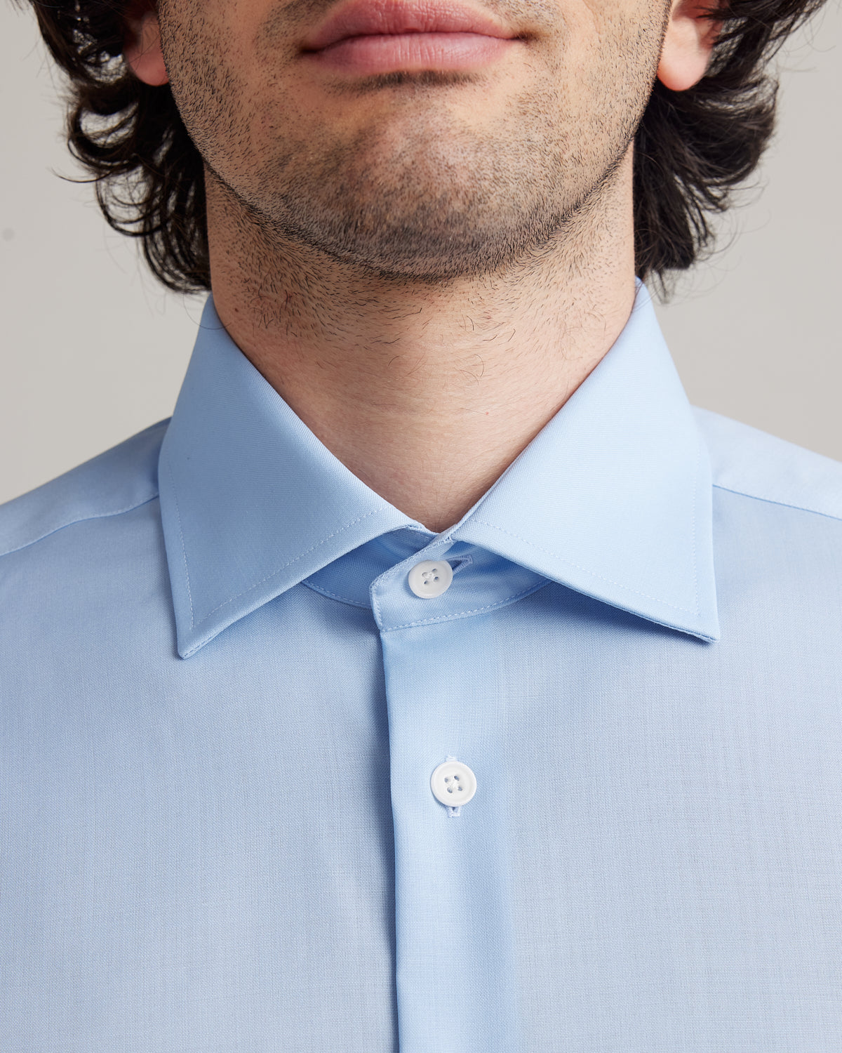 English spread collar on light blue formal merino wool shirt for men