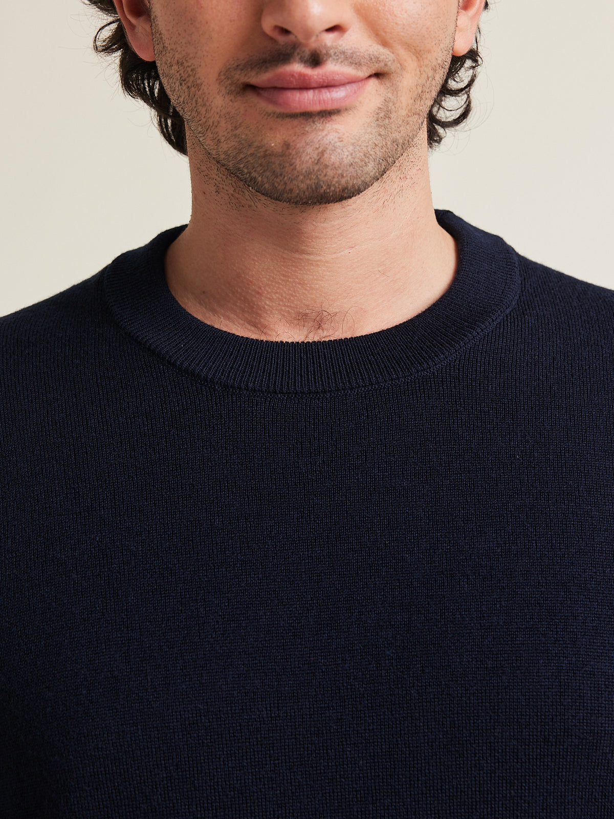 close up of round double knit collar on merino wool sweater in dark navy
