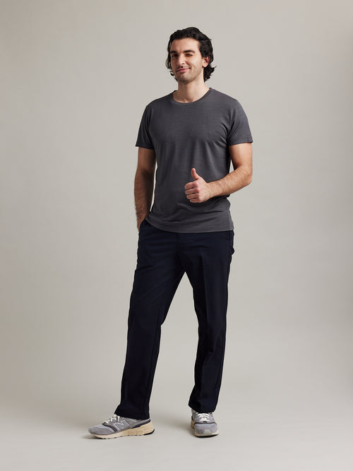 Front view of a men's dark grey T-shirt, crew neck style, designed by Wolk.