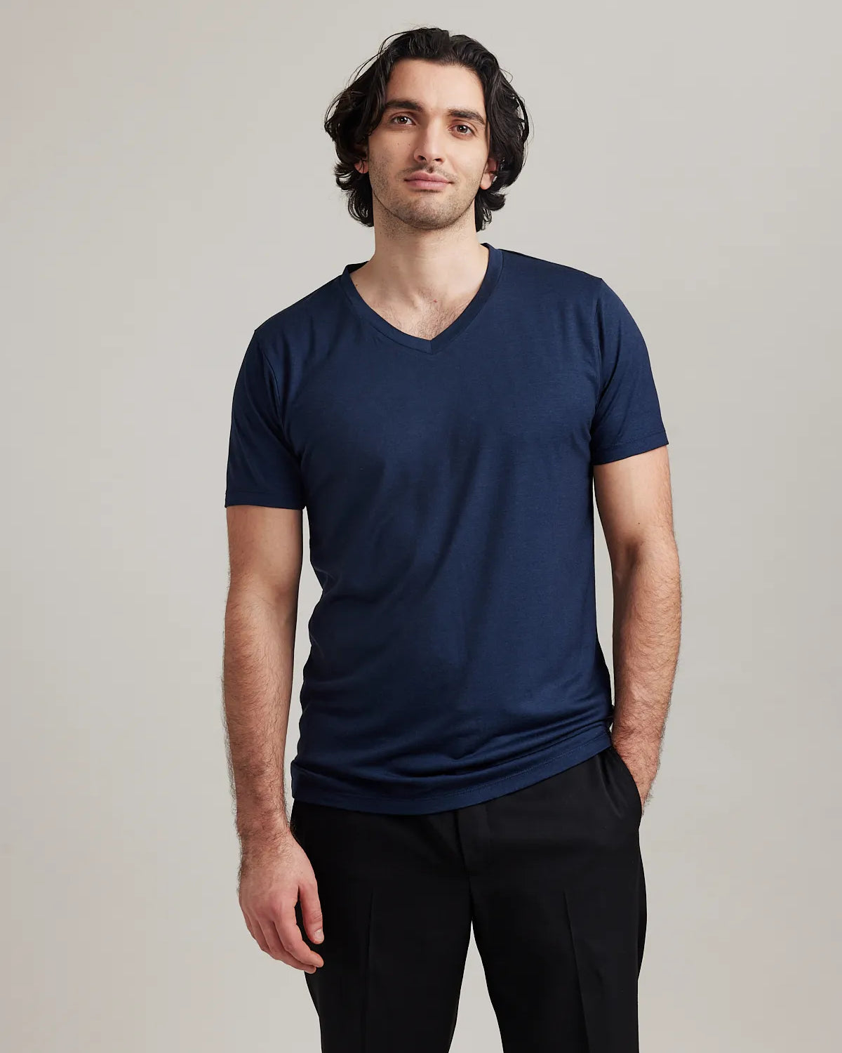 Front view of Wolk's merino wool T-shirt for men in navy with V neck designed for style and breathability, made in Europe
