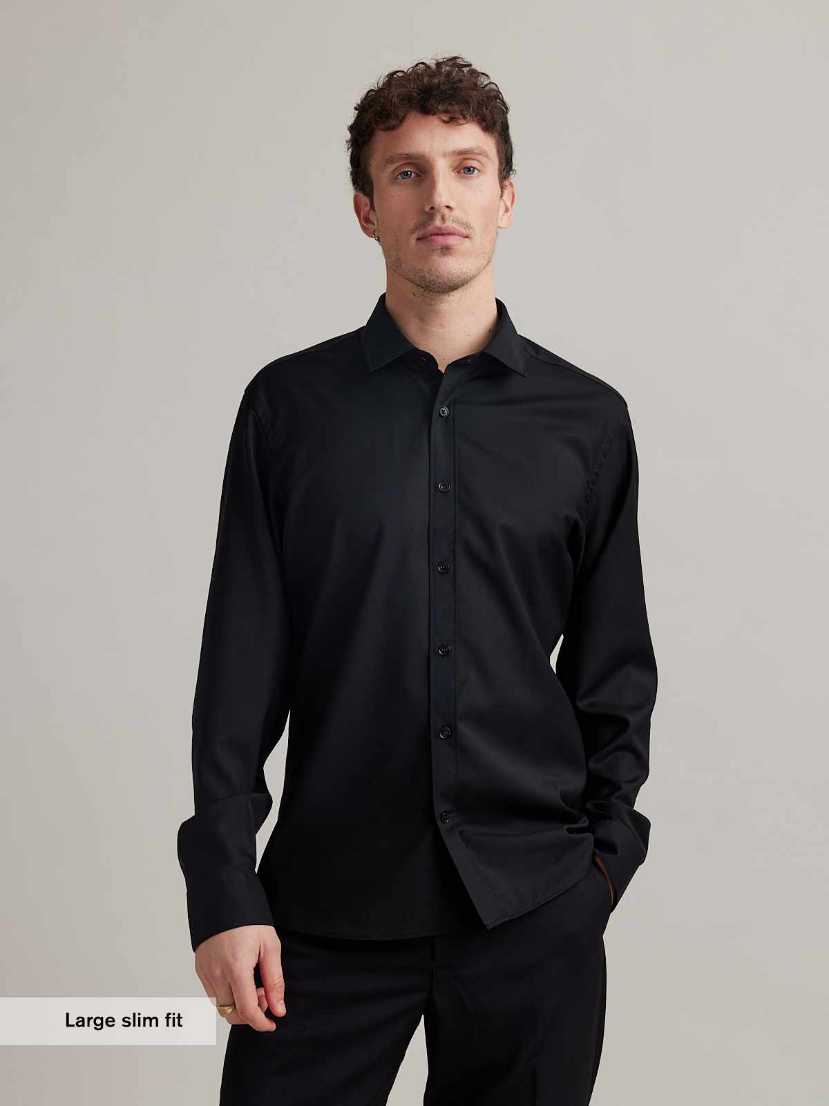 Wolk - man wearing merino wol shirt in black color in slim fit