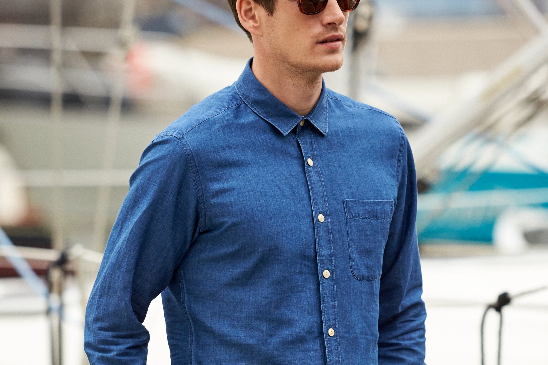men wearing indigo linen shirt with long sleeves and chest pocket