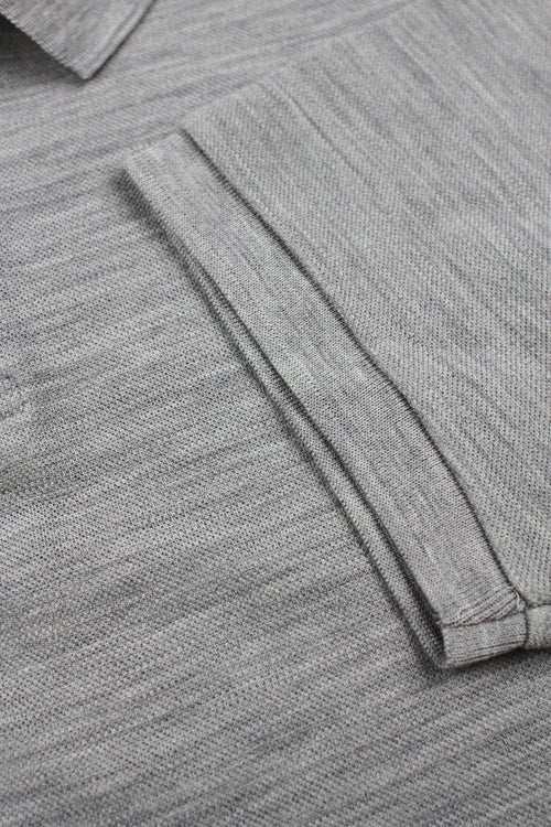 detail of rib on cuff of grey melange polo