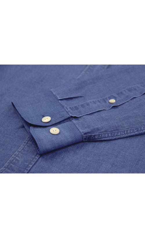 cuff detail of linen shirt in blue indigo color