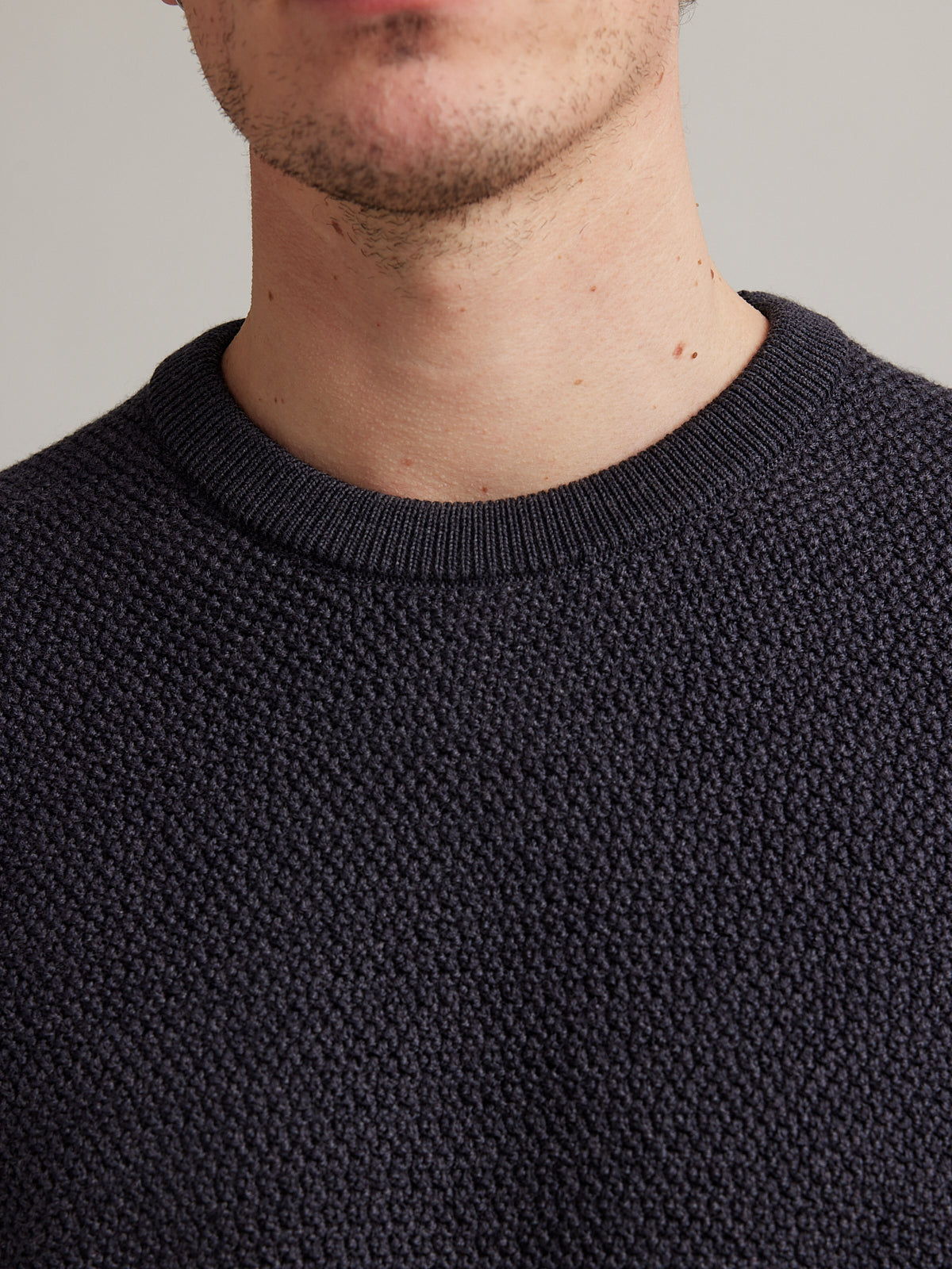 rice knit stitch on merino wool sweater with crew neck and double layered collar for men