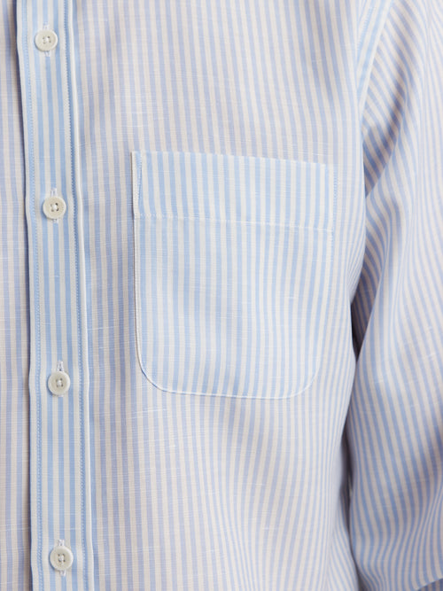 chest pocket detail of merino linen shirt from Wolk with light blue bengal stripes