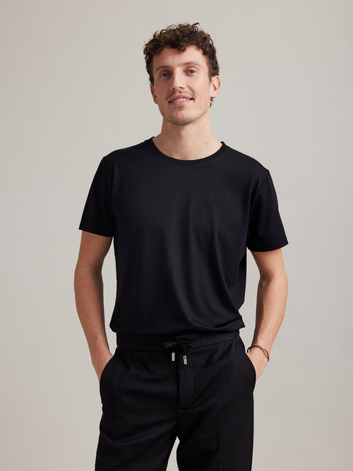 Wolk-Man wearing Climaforce Merino T-shirt in black and round neck