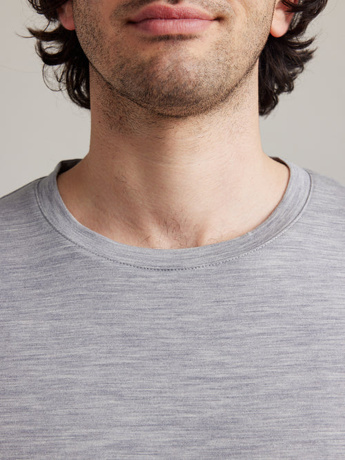 Close up of T-shirt collar in merino wool in light grey melange