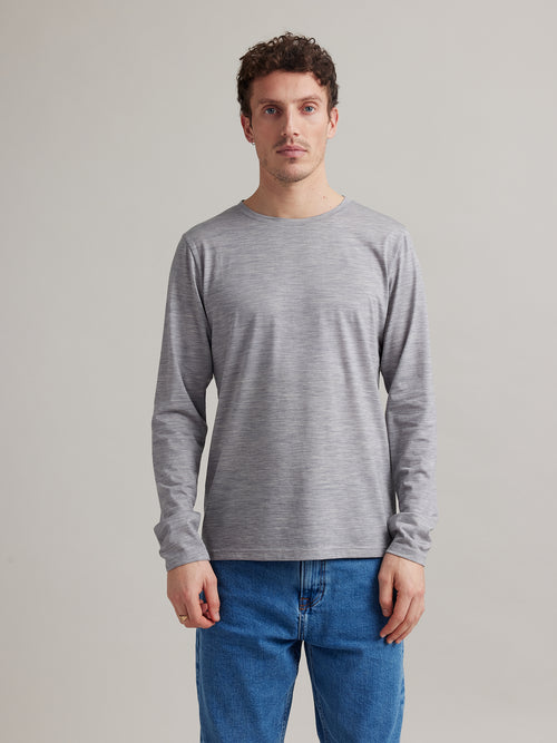 man wearing long sleeve merino T-shirt in light grey color