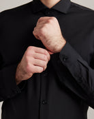 cuffs of merino wool shirt from Wolk in black with black buttons