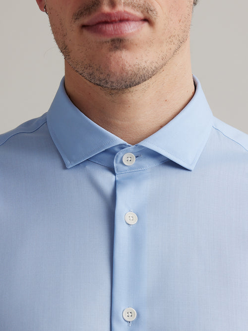 detail of spread collar on a merino wool formal shirt in light blue from Wolk Antwerp