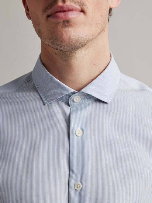 spread collar detail on light blue merino shirt for man