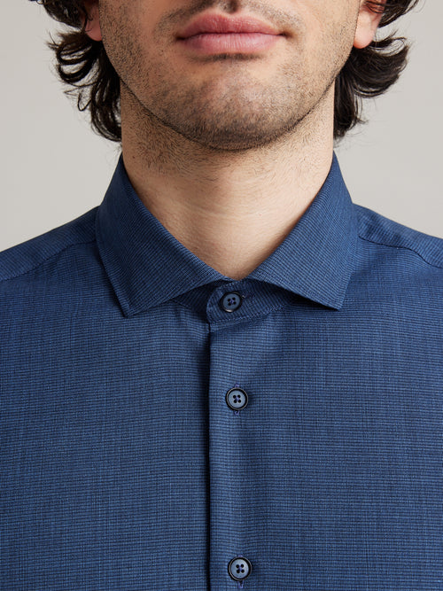 spread collar detail on men merino shirt in navy color with navy buttons from Wolk