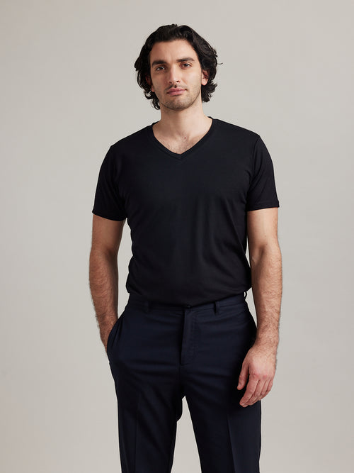Wolk- man wearing Climaforce Merino wool T-shirt-black V-neck made in Europe with short sleeves