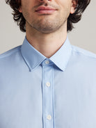 classic collar on a light blue merino wool shirt from Wolk