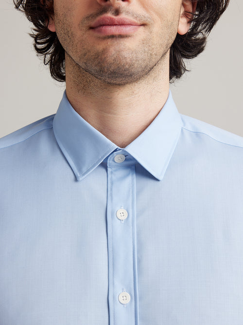 classic collar on a light blue merino wool shirt from Wolk