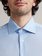 English spread collar on light blue formal merino wool shirt for men