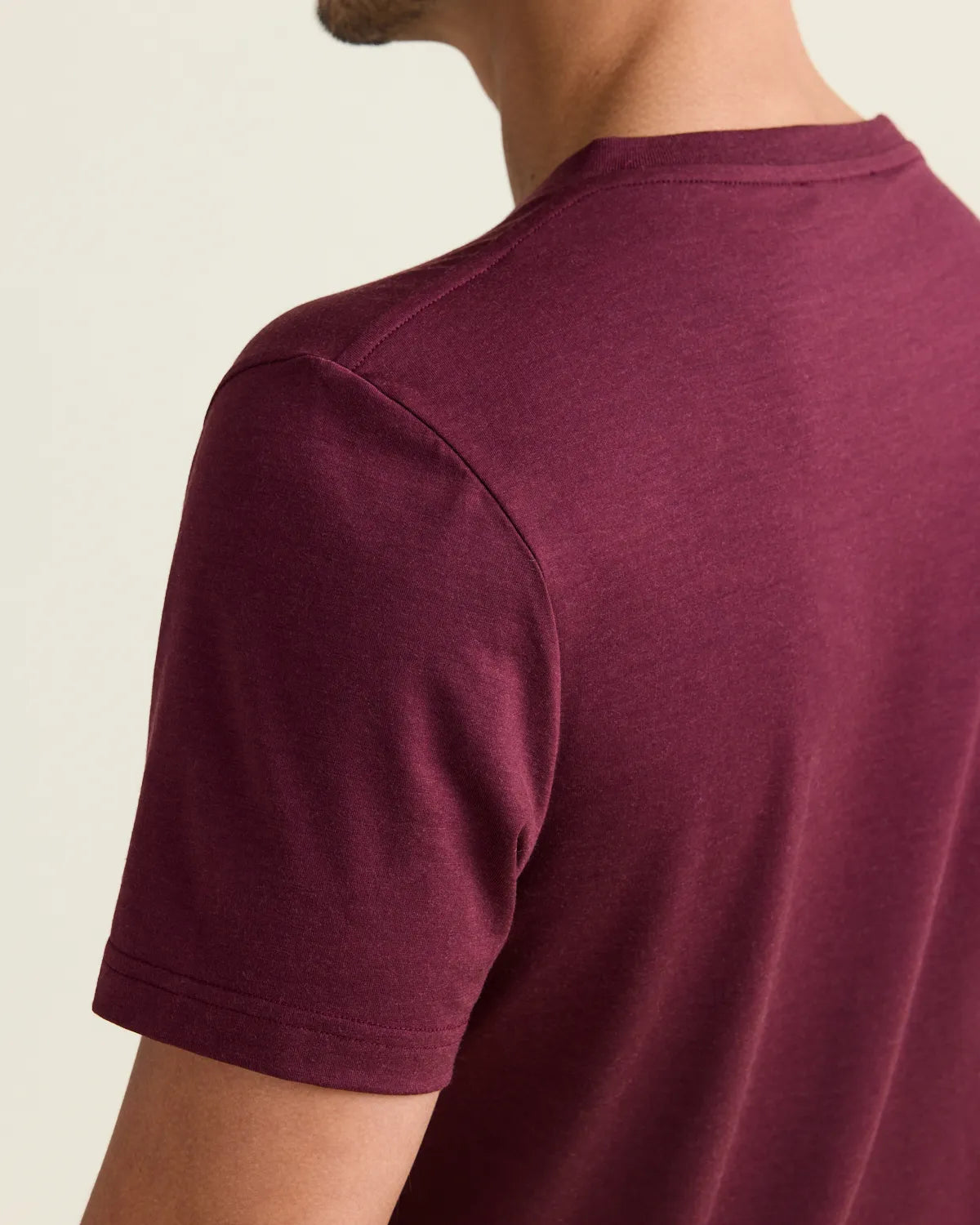 shoulder detail of a burgundy men's merino tshirt