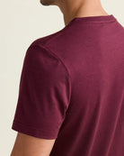 shoulder detail of a burgundy men's merino tshirt