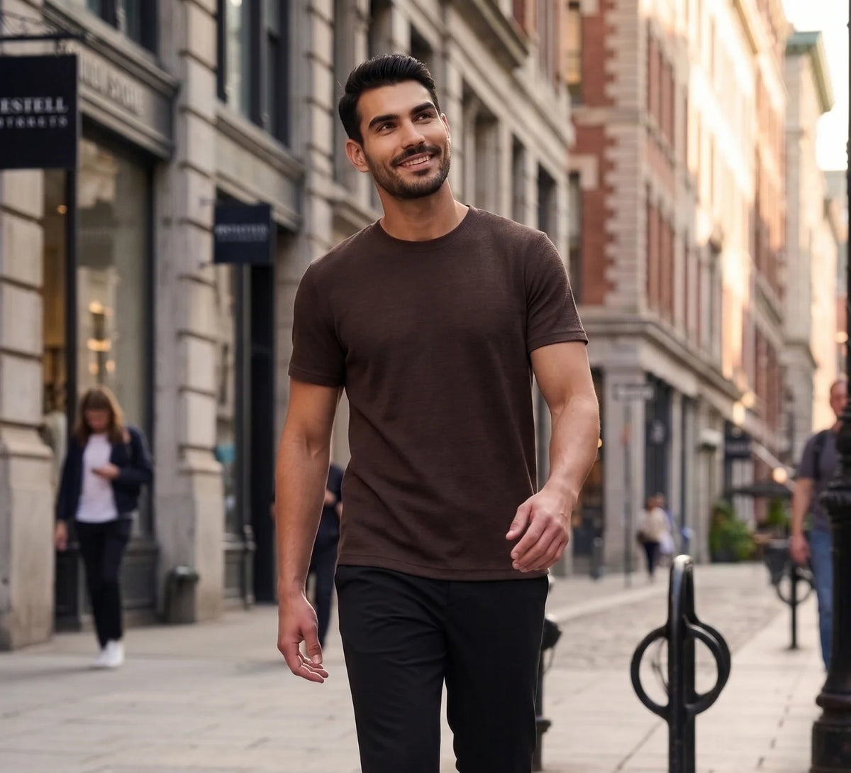 Man wearing a dark brown colored merino wool T-shirt from Wolk