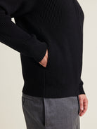 Side pockets on full- zip wool vest in black