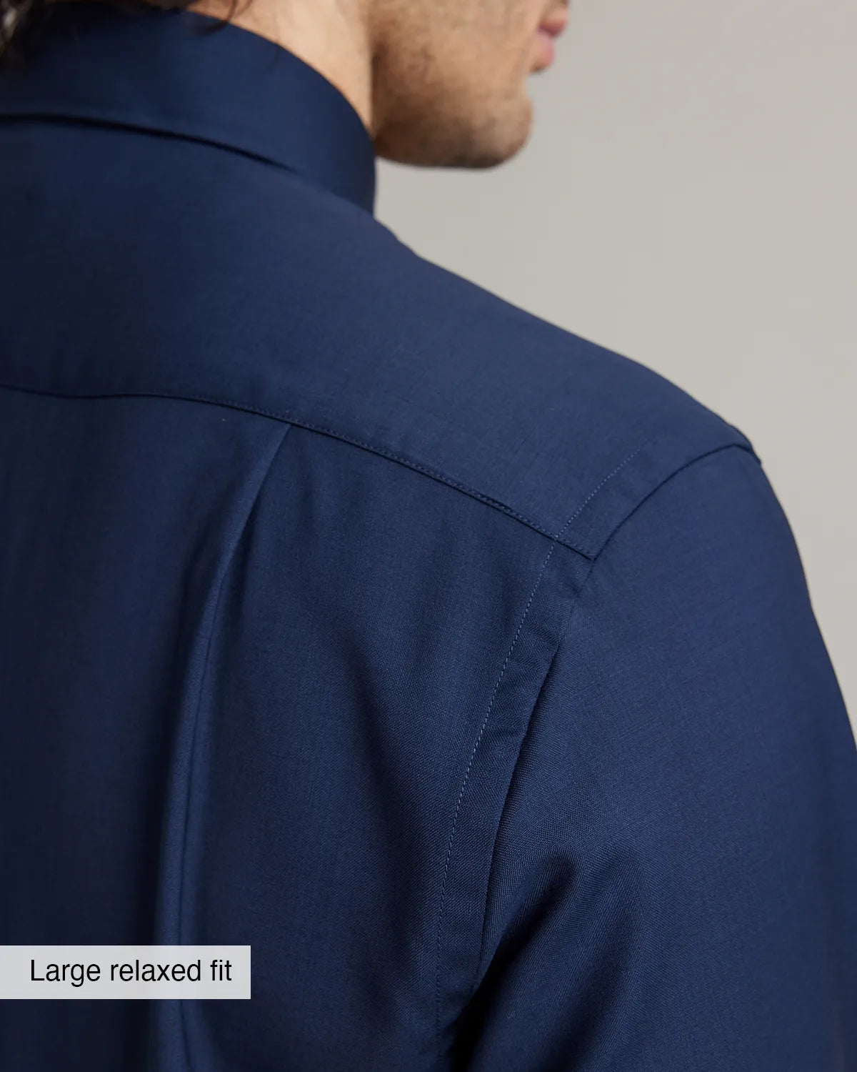 back pleat detail on a navy blue merinowool dress shirt for men