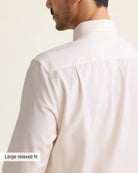 back pleat detail on a white merinowool dress shirt in relaxed fit