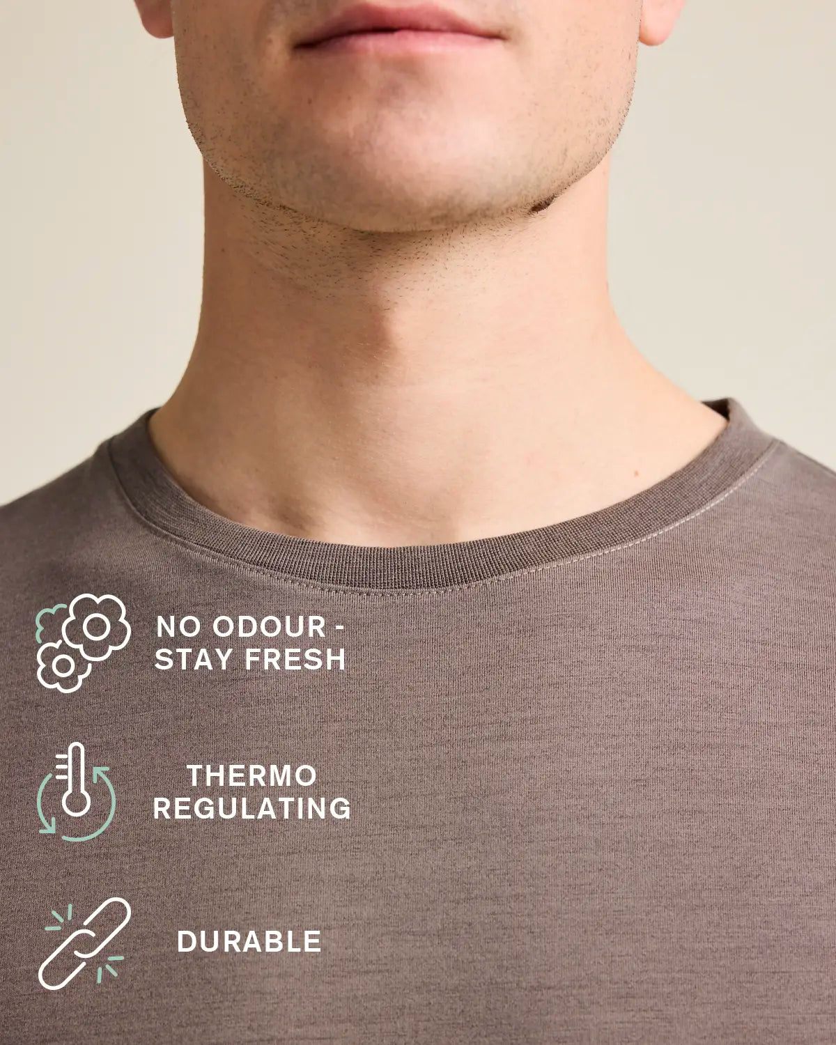 Brown merinowool t-shirt with text stating no odour-stay fresh, thermo regulating, durable
