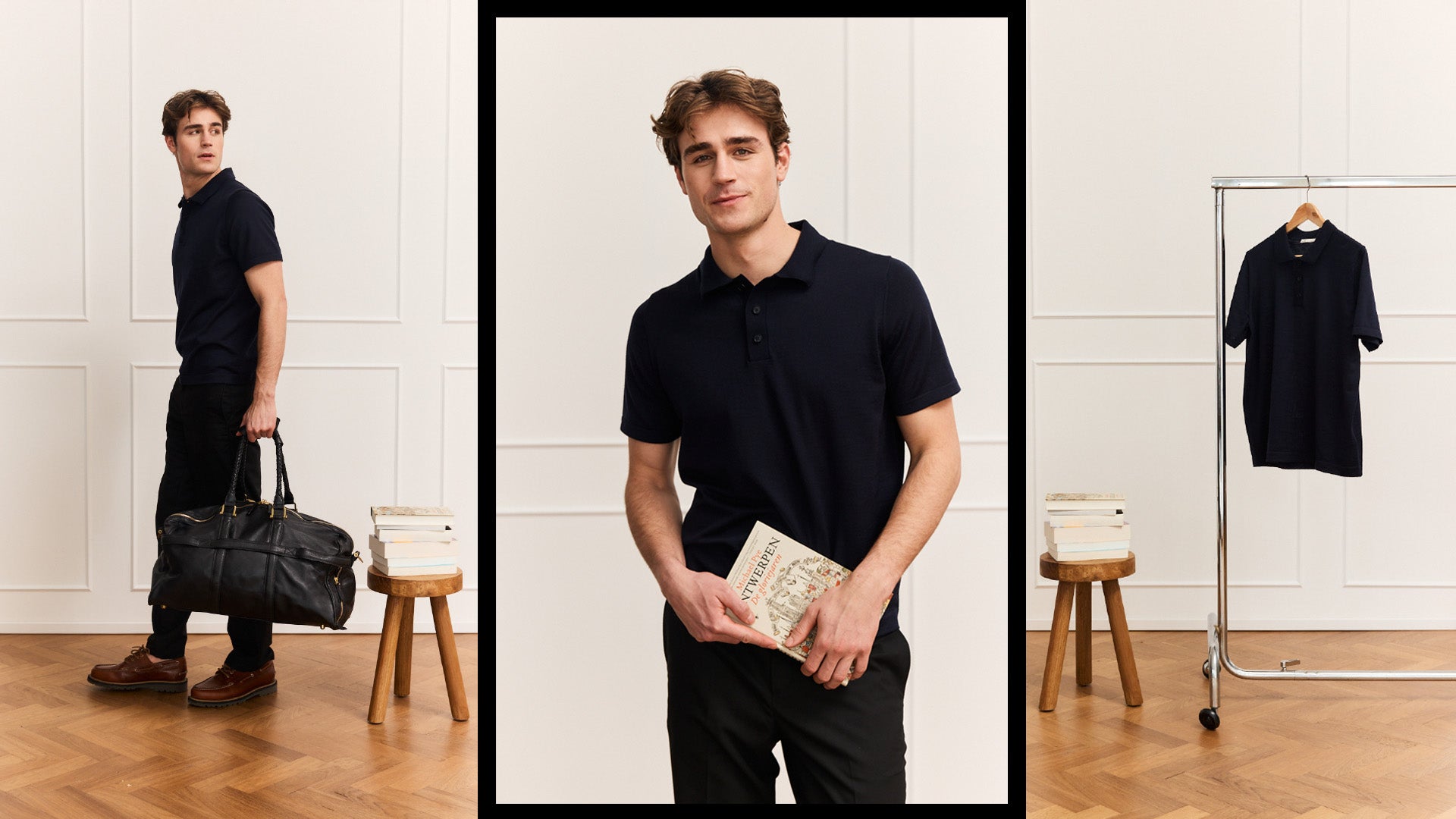 Man holding a black bag and a book in a minimalistic setting with dark navy merino wool knit polo shirt from Wolk