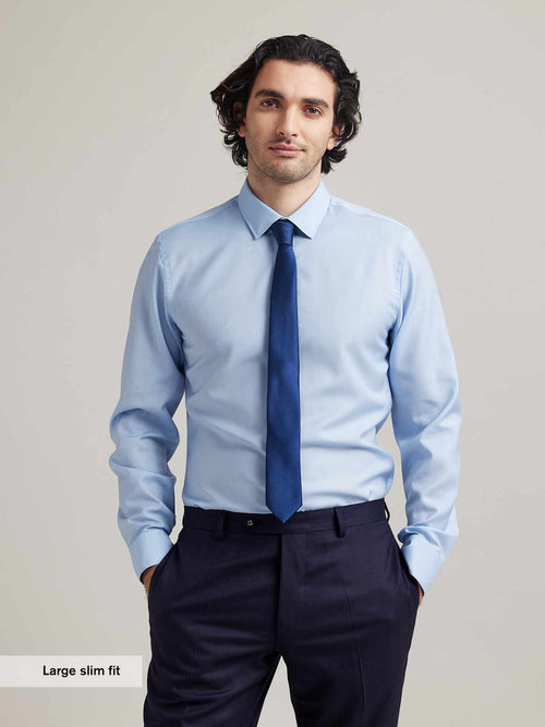 dressed merino wool shirt in light blue with navy tie