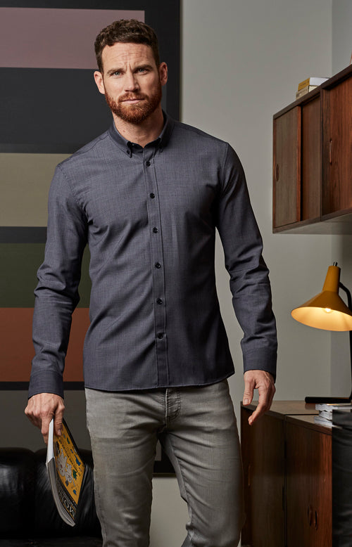 Wolk- man wearing merino wool shirt button down grey navy mini gingham with long sleeves