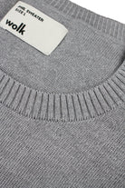 Wolk label on merino wool sweater in light grey melange color