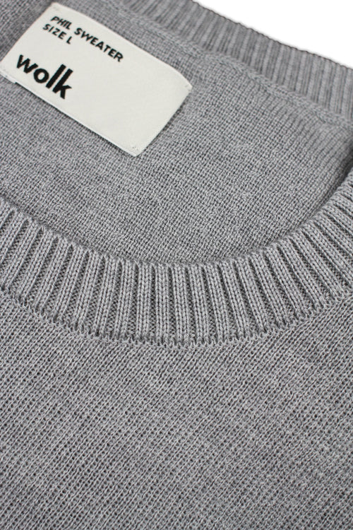 Wolk label on merino wool sweater in light grey melange color