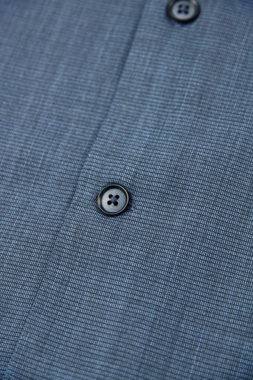 Dark blue corrozo buttons on  merino wool shirt from Wolk